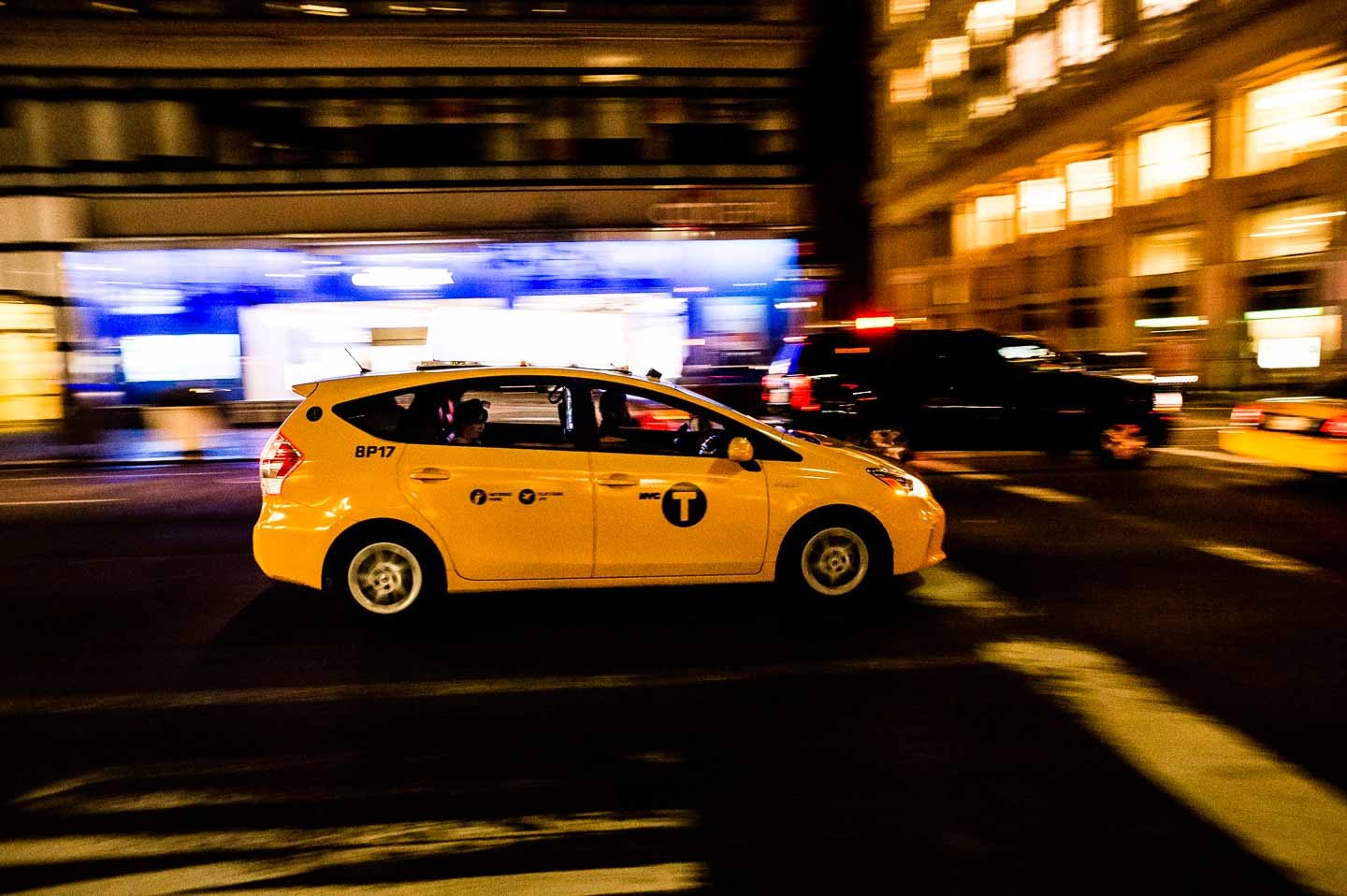 New York Yellow Caps Rush by Night