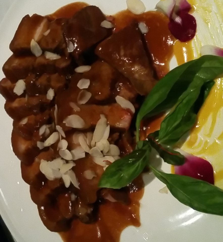 Pork belly with almonds and sweet cinnamon sauce Pork belly with almonds and sweet cinnamon sauce